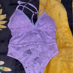 Lavender Bodysuit.Never worn. Has its tags, bought from a small biz in LA.